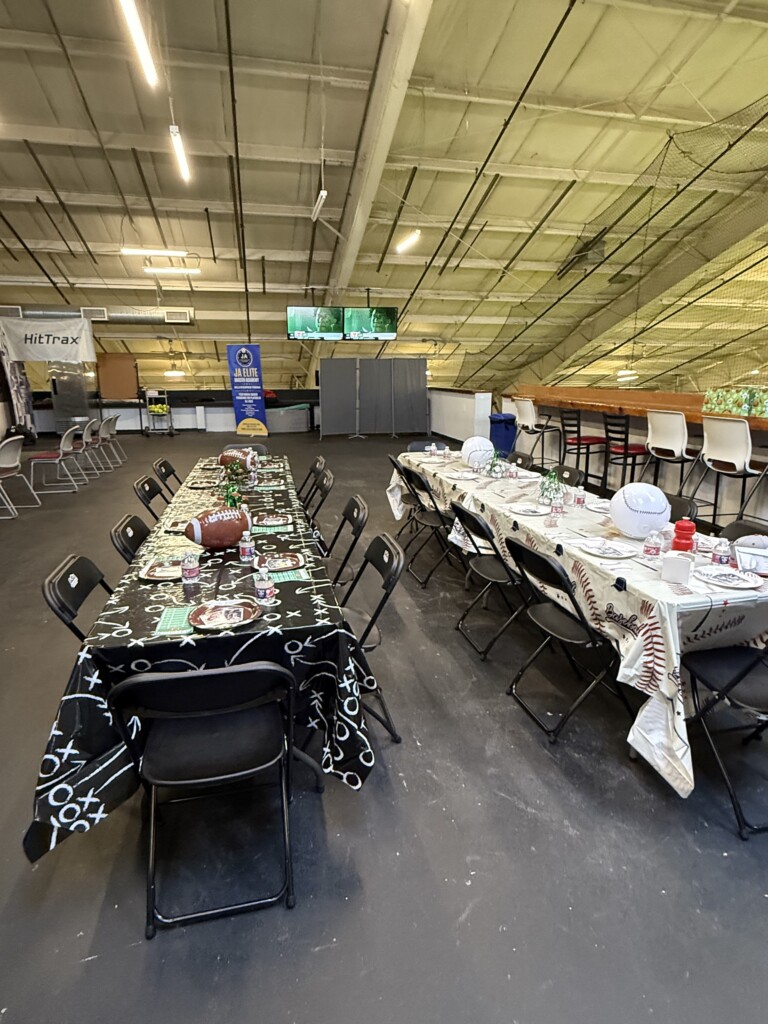 Side-by-side baseball and football birthday party table setups at BVSA